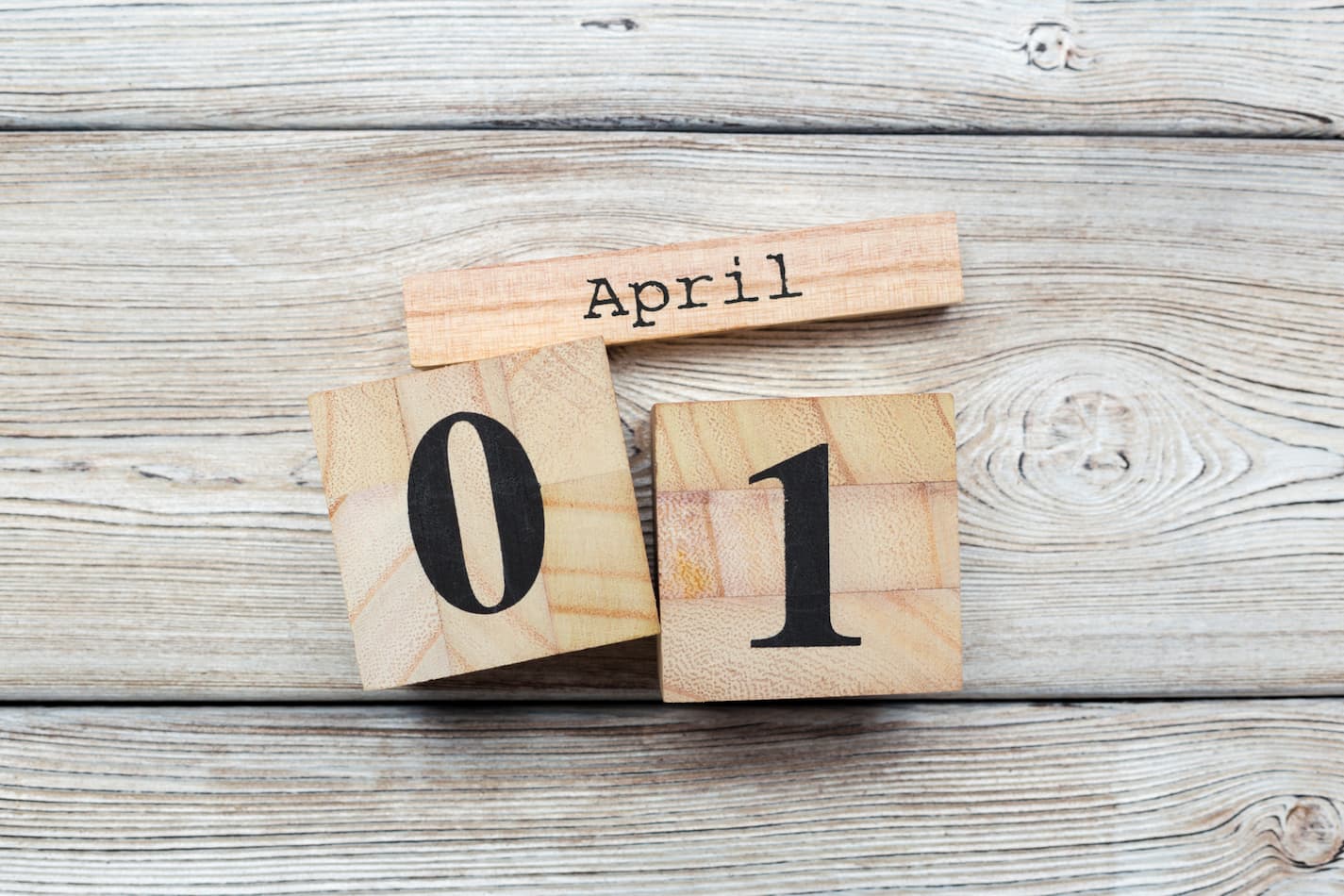 image of blocks with April 01 on a wooden background