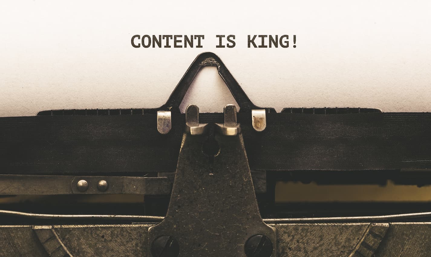 image of typewritten words Content is King